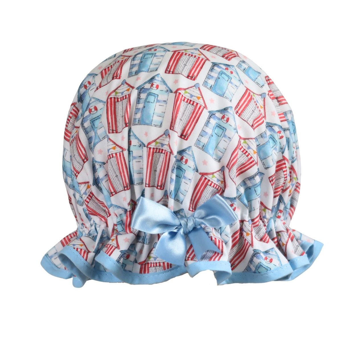 "Vintage style women's roomy cotton shower cap featuring multi-coloured beach huts on a white background. Trimmed sea blue with matching satin bow.
"