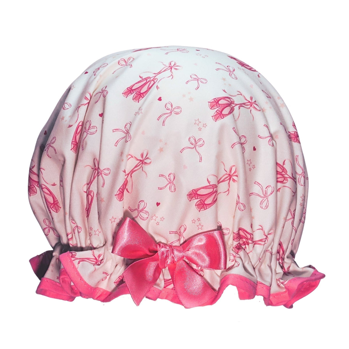 Vintage style kids cotton shower cap. Frilled edge, 100% cotton print featuring pink ballet slippers and bows on an ivory background. Trimmed in pink with matching satin bow