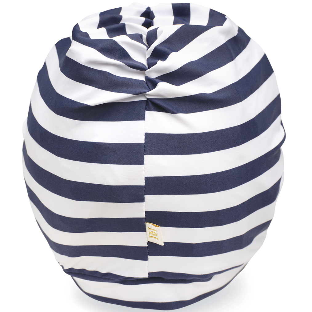 Striped turban with navy and white stripes on a white background