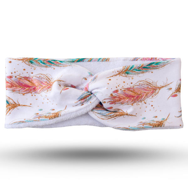 Multi coloured feather print on white background towelling lined stretch jersey hairband, with white microfibre lining, with twist at top
