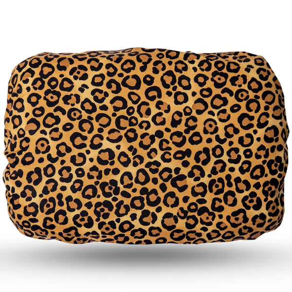 Soft waterproof rectangular bath pillow covered in a cotton animal print. Suckers on reverse.