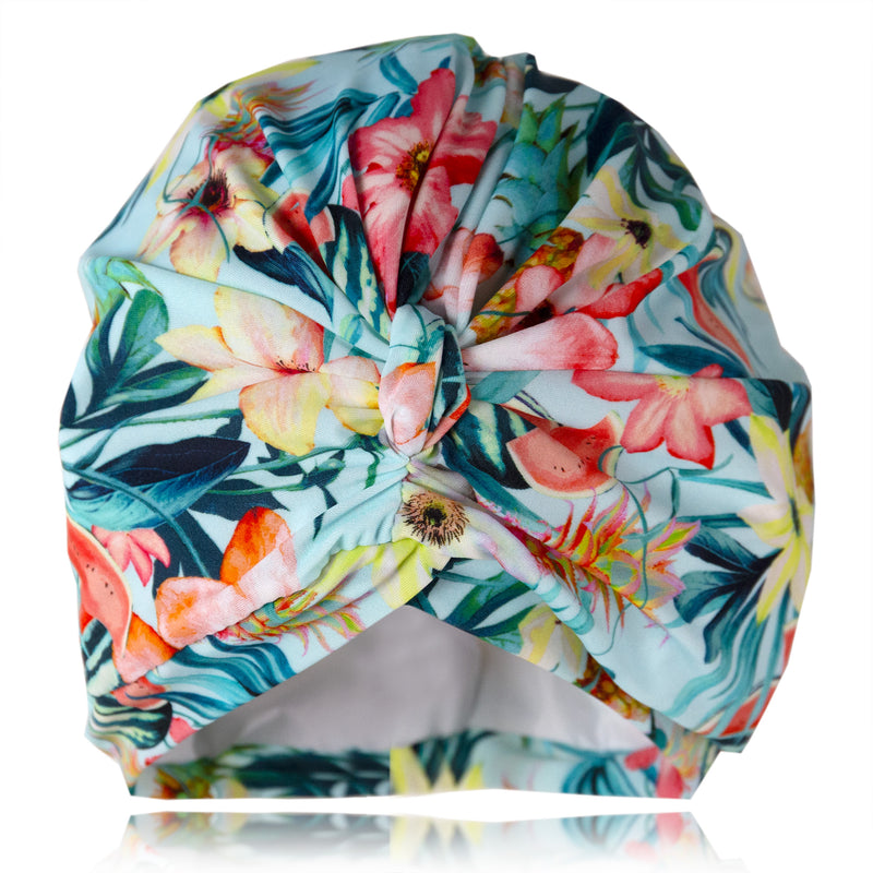 Bright, multicoloured tropical lycra pull on waterproof shower turban, with pretty gathered know at front