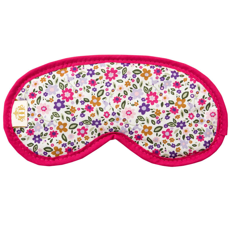 Small pink, green and purple flower print sleep mask.  Navy velour backing and elastic.  Edged in cerise.
