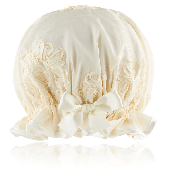 Vintage style woman's frilled style cream taffeta shower cap.  Cream ribbon embroidery with cream trim and satin bow.