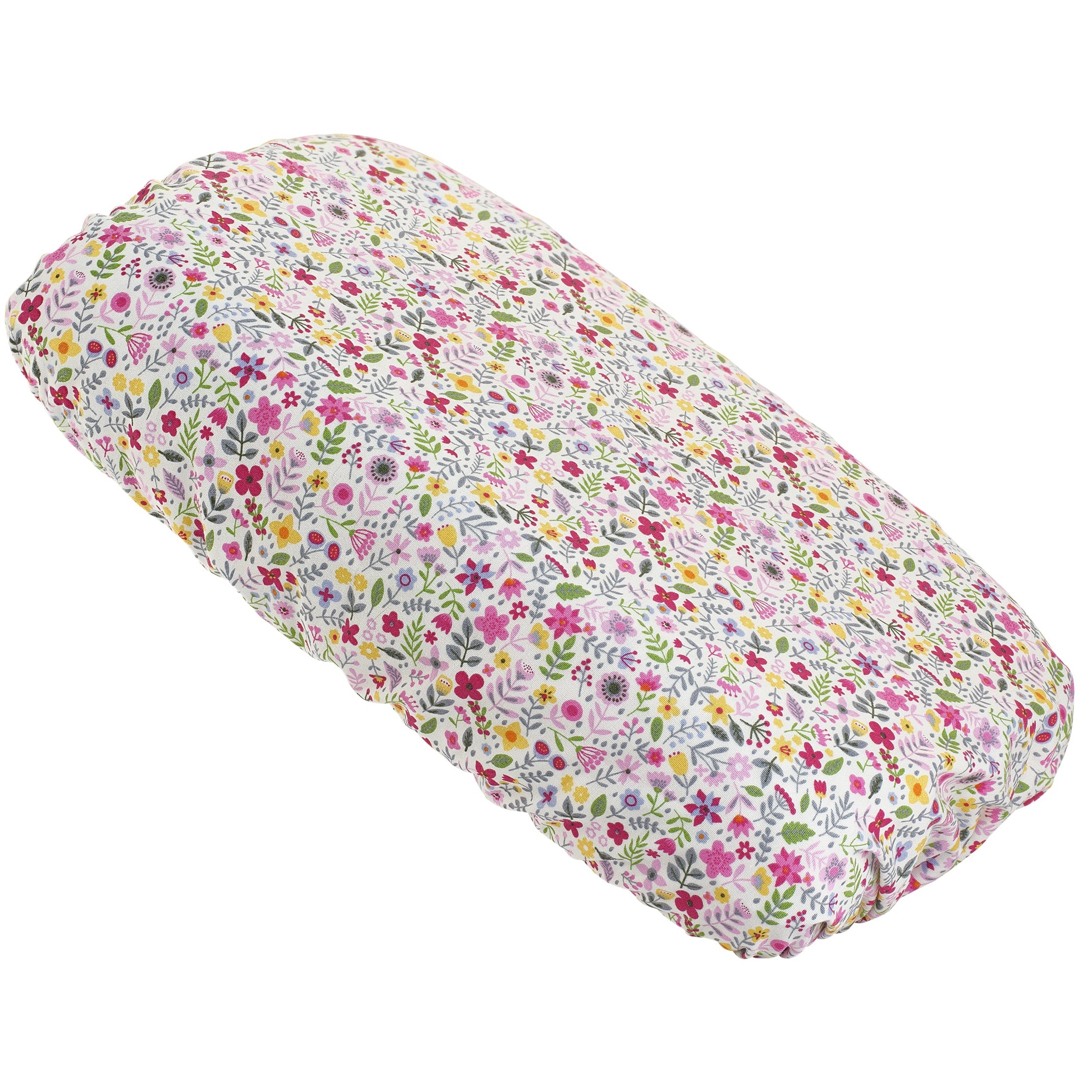 Soft waterproof rectangular bath pillow covered in a pink, cerise, green, blue and yellow floral cotton print.  Two suckers on reverse.