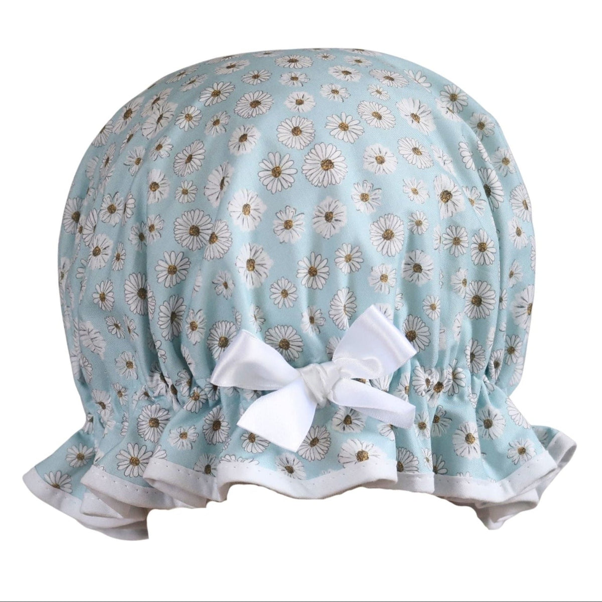 Vintage style women's roomy shower cap.  Frilled edge, white daisies on blue background cotton print with crisp white trim and matching satin bow