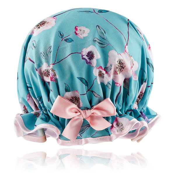 Retro style woman's frilled style shower cap.  Satin floral print on jade background with pink trim and satin bow.