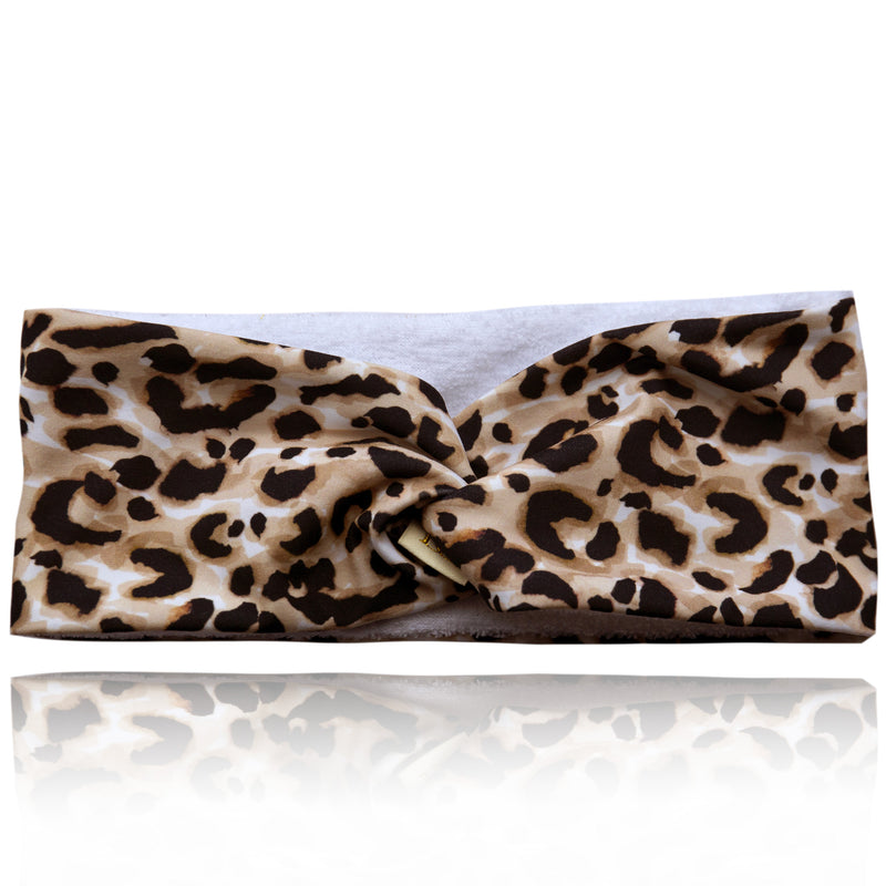 Cream, black and white animal print hairband,  with white microfibre lilning, with twist at top
