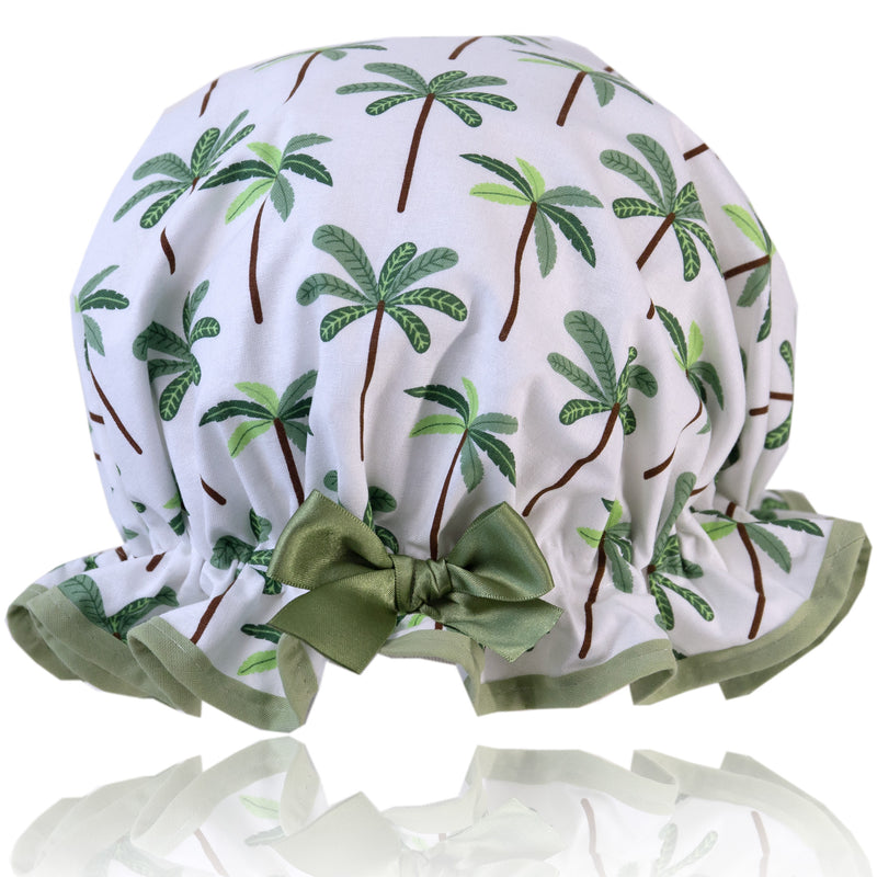 Vintage style, women's large cotton shower cap.  Frilled edge, green palm tree print trimmed in sage green and matching satin bow.
