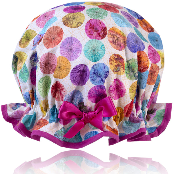 Vintage style, women's large cotton shower cap.  Frilled edge, multi-coloured parasol print trimmed in warm pink and matching satin bow.