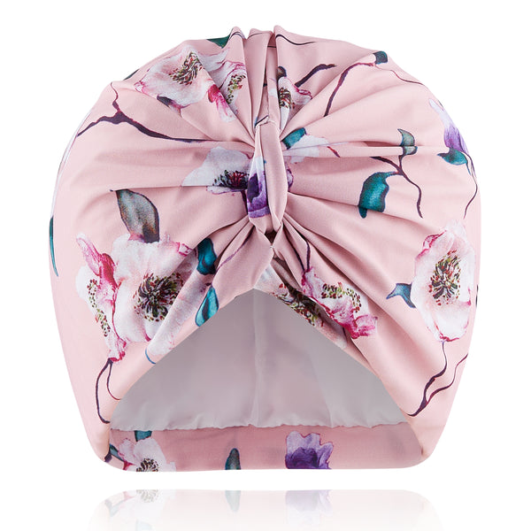 Delicate pink floral lycra pull on waterproof turban, with pretty gathered knot at front