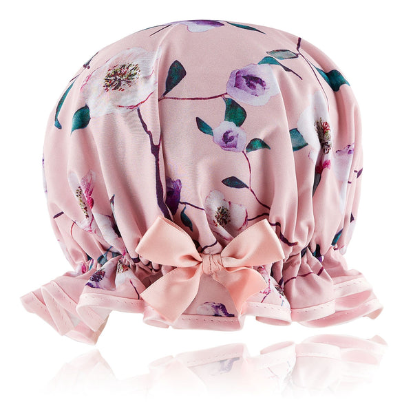 Vintage style woman's frilled style shower cap.  Satin floral print on pale pink background with pink trim and satin bow.