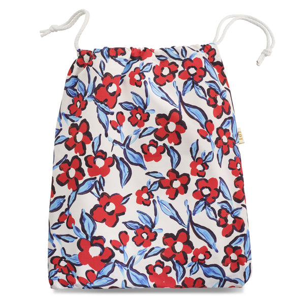 Red and blue stretch lycra floral print washbag with white cord pulls and white waterproof lining