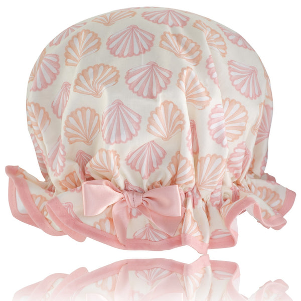 Vintage style women's large cotton shower cap.  Frilled edge, coral & pink sea shell print. Complementary coral trim and satin bow.