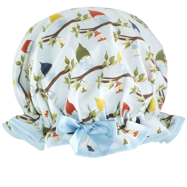 Vintage style women's large cotton shower cap.  Frilled edge, blue with colouful sleeping owls on branches print. Complementary pale blue trim and satin bow.