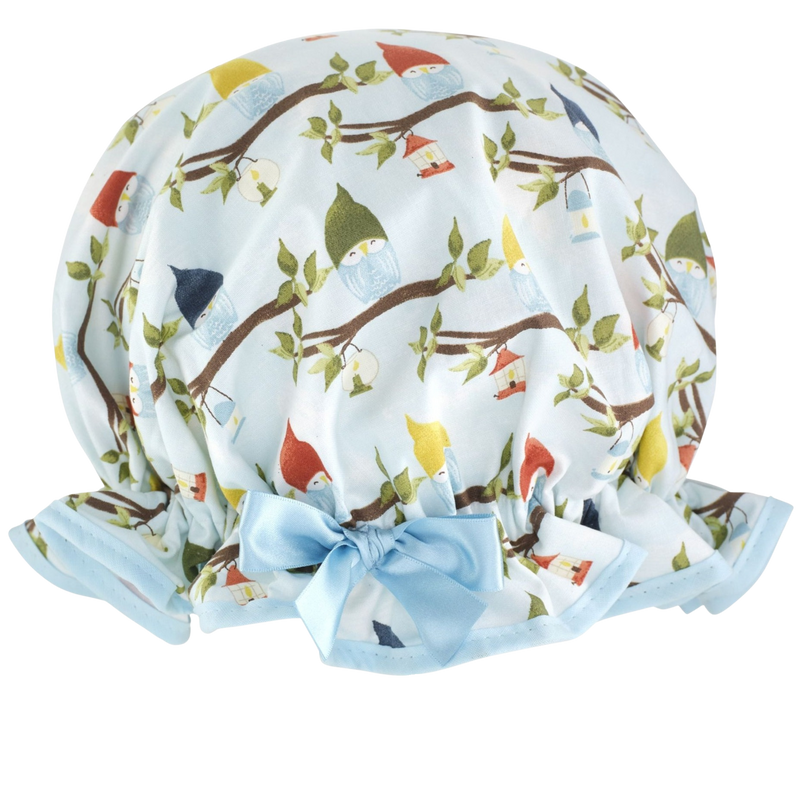 Vintage style women's large cotton shower cap.  Frilled edge, blue with colouful sleeping owls on branches print. Complementary pale blue trim and satin bow.