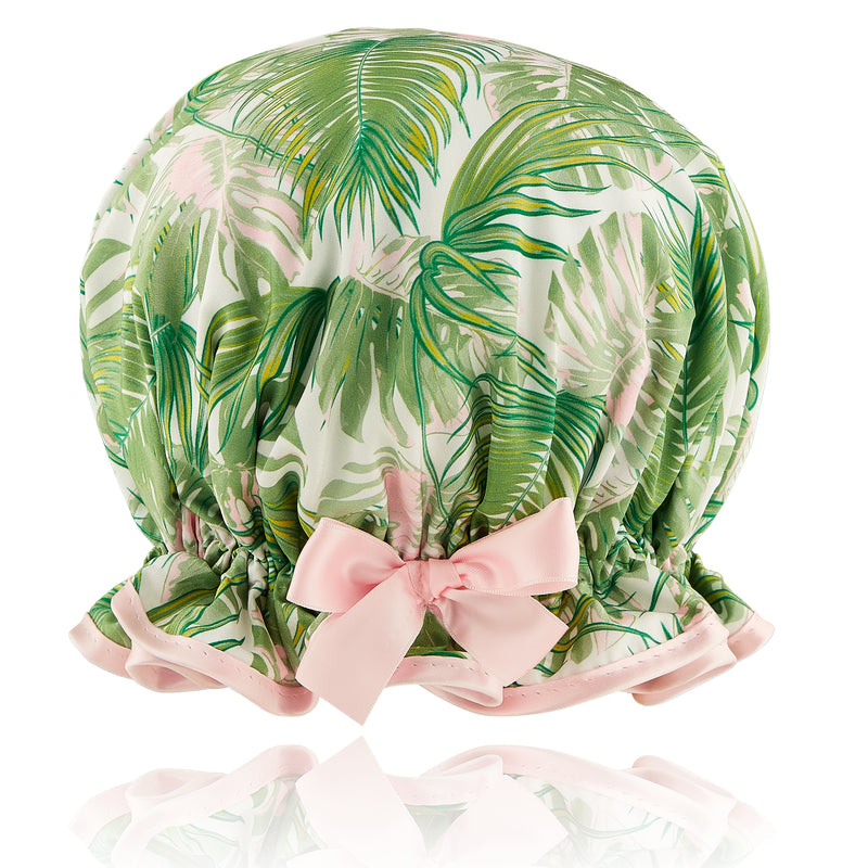 green and pink hued lycra pull on waterproof turban, with pretty gathered know at front