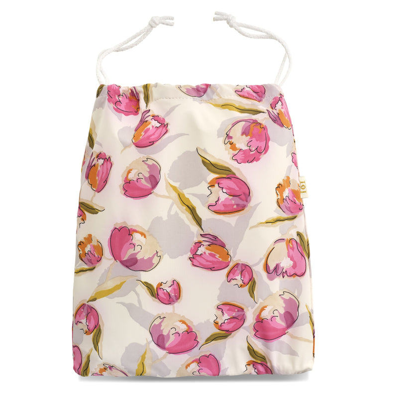 Pink tulip print on white lycra background washbag with white cord pulls and white waterproof lining
