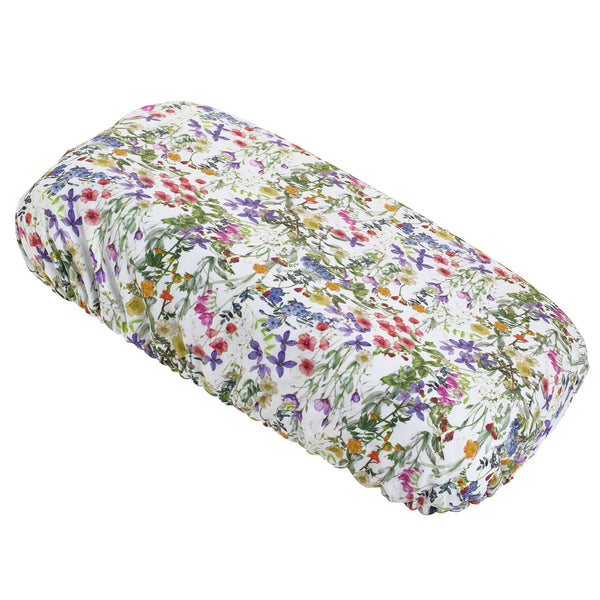 Soft waterproof rectangular bath pillow covered in a pastel pink and green cotton print.  Two suckers on reverse. 
