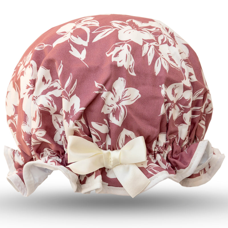 Vintage style, women’s large cotton satin stretch shower cap. Frilled edge, ivory flowers on dusky rose pink background with ivory trim and matching satin bow.