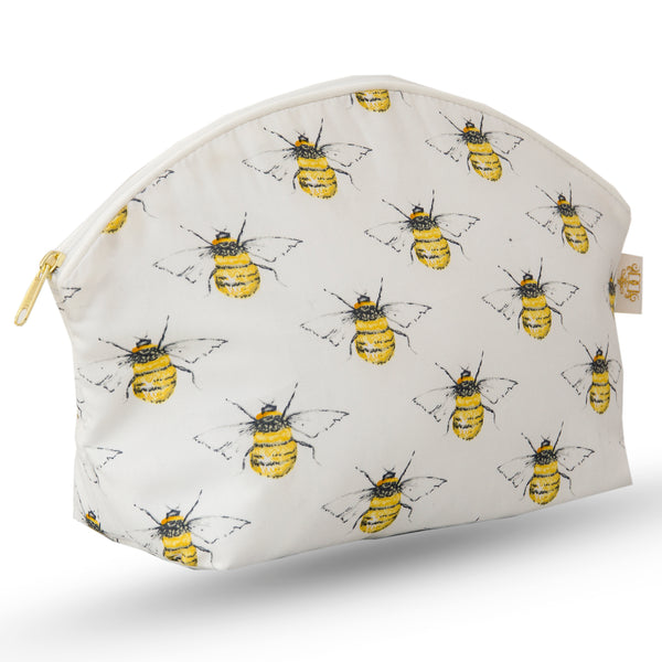 Curved zip top cotton sponge bag.  Symmetric bee print on ivory background.  Trimmed in ivory with cream zip.