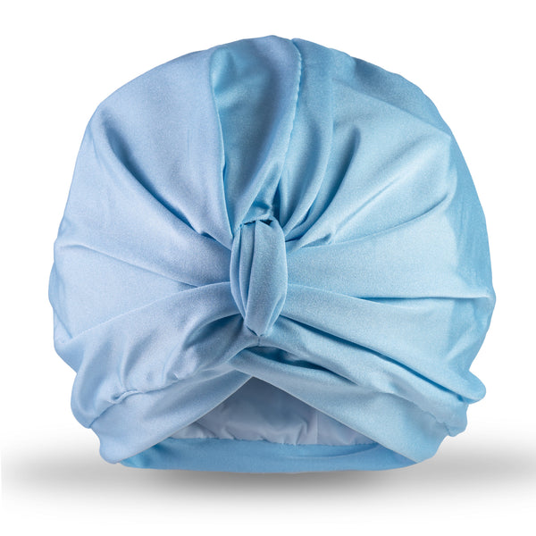 Plain pale blue lycra pull on waterproof turban, with pretty gathered knot at front.