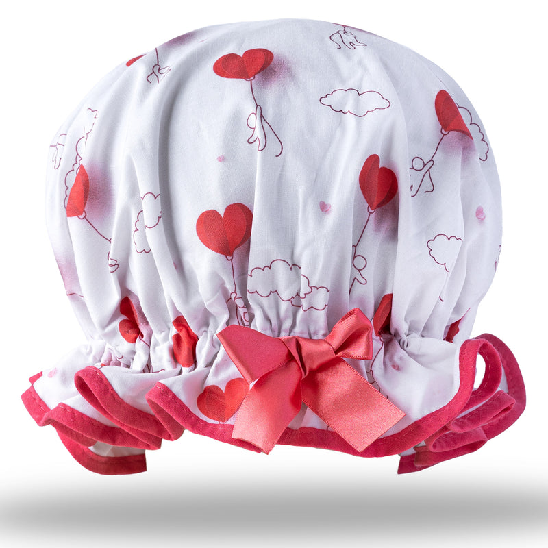 Vintage style women's large cotton shower cap.  Frilled edge, pencil outline character floating with heart balloon on white background with rose pink trim and satin bow