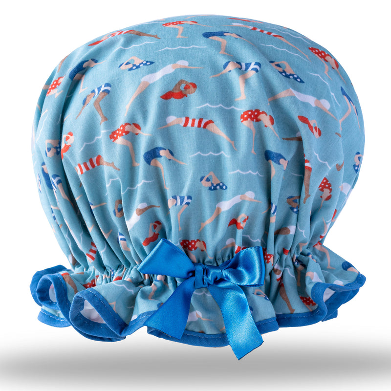 Vintage style women's large cotton shower cap.  Frilled edge, cute swimmers print on blue background.  With blue trim and satin bow.