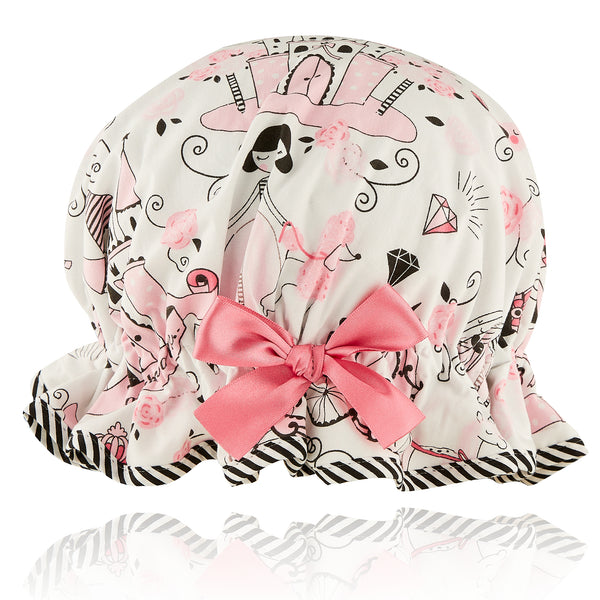Vintage style kid's cotton shower cap.  Frilled edge, pink and black princess and unicorn drawn carriage cotton print with castles and jewels. Black and white striped trim with pale pink bow.