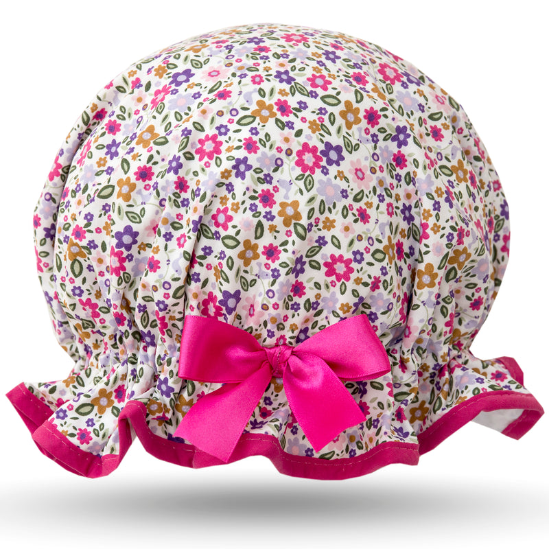 Vintage style, women’s large cotton shower cap. Frilled edge, small pink, green and purple flower print with cerise trim and matching satin bow.