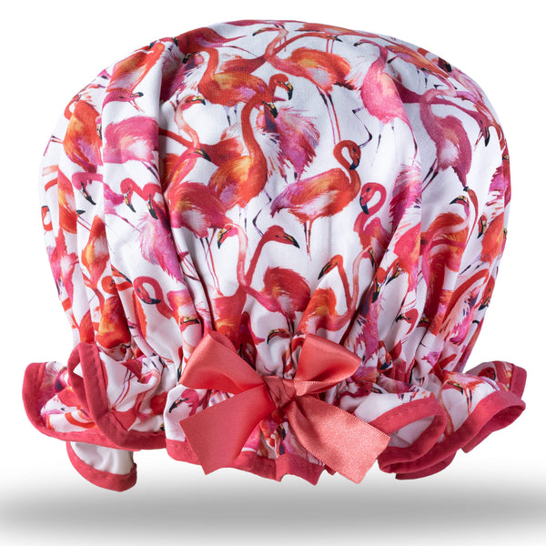 Vintage style, women's large cotton shower cap.  Frilled edge, pink and red flamingo print on white background. Trimmed in rose pink with matching satin bow.