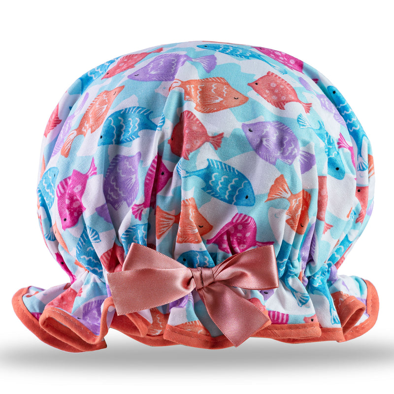 Vintage style women's large cotton shower cap.  Frilled edge, cute fish print in orange, pink, blue and purple with matching coral trim and satin bow.