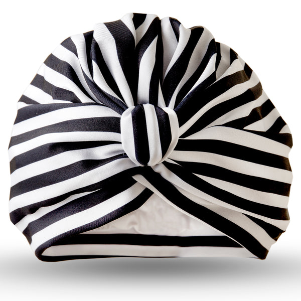 Black and white stripe lycra pull on waterproof turban, with pretty gather and knotted at front.